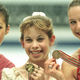 Michelle Kwan, Tara Lipinski, and Vanessa Gusmeroli at the World Figure Skating Championships in Lausanne, Switzerland on March 22, 1997. (Via AP Images.)